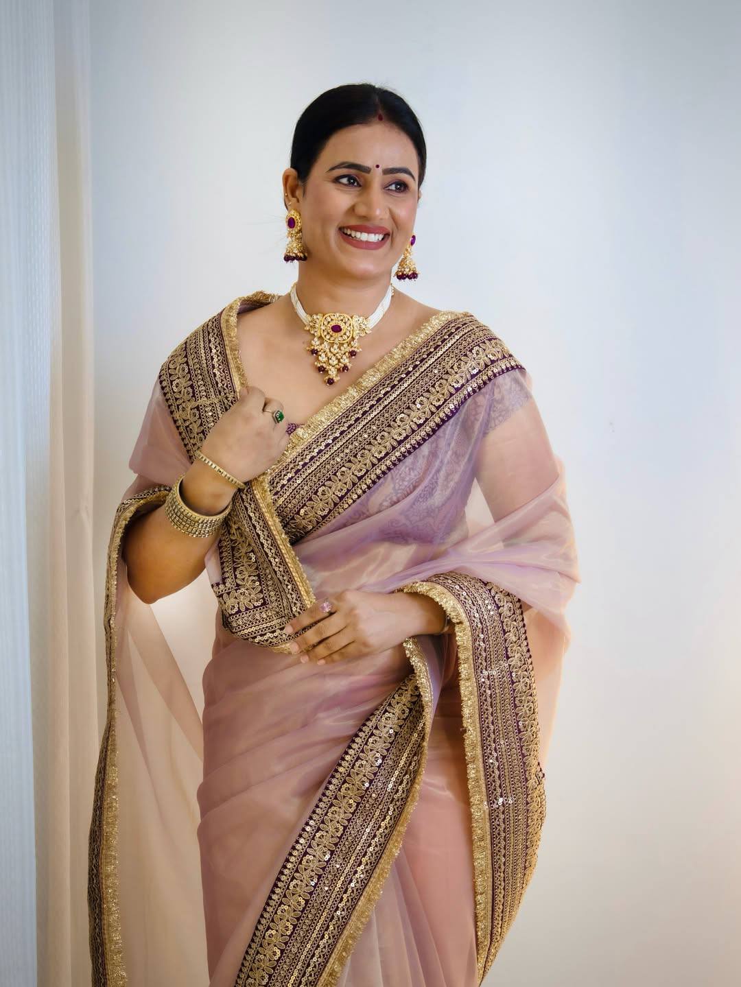 Designer Soft Twill Net Fancy Lace Border Saree