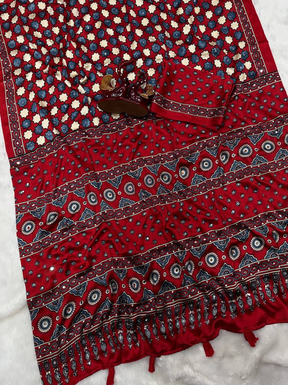 SAREE FAB. : Soft Japan Satin  ⭕ WORK : Beautiful Ajarakh print with Real mirror work and beautiful tussle  ⭕ BLOUSE Running Saree Fabric